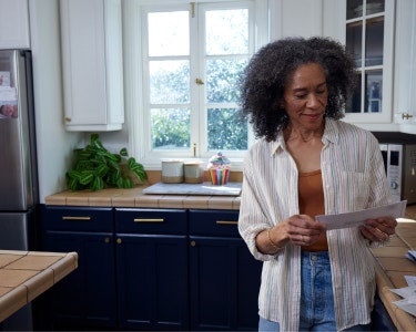 Portrayal of a post menopausal woman in her home kitchen