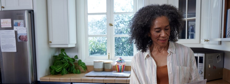 Portrayal of a post menopausal woman in her home kitchen